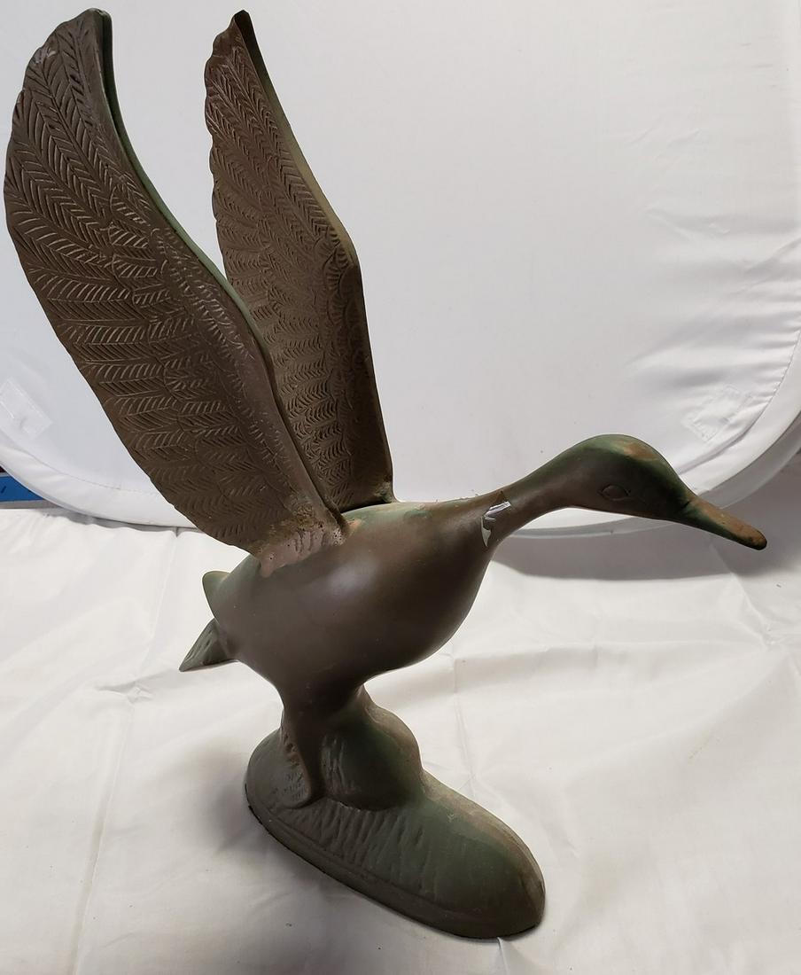 Solid brass flying duck (1 of 1)