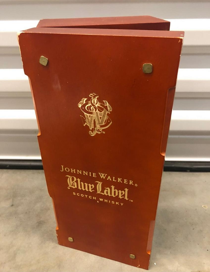 Johnnie Walter Blue label scotch whiskym wooden box,: Johnnie Walter Blue label scotch whiskym wooden box, with blue velvet interior. 13" tall