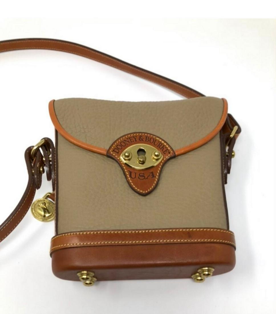 Dooney and bourke, Brown with a brown border: Dooney and bourke, Brown with a brown border