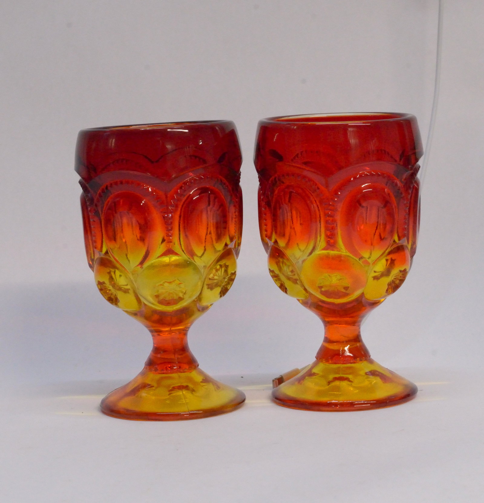 Pair of red and yellow glass goblets 6" tall: Pair of red and yellow glass goblets 6" tall