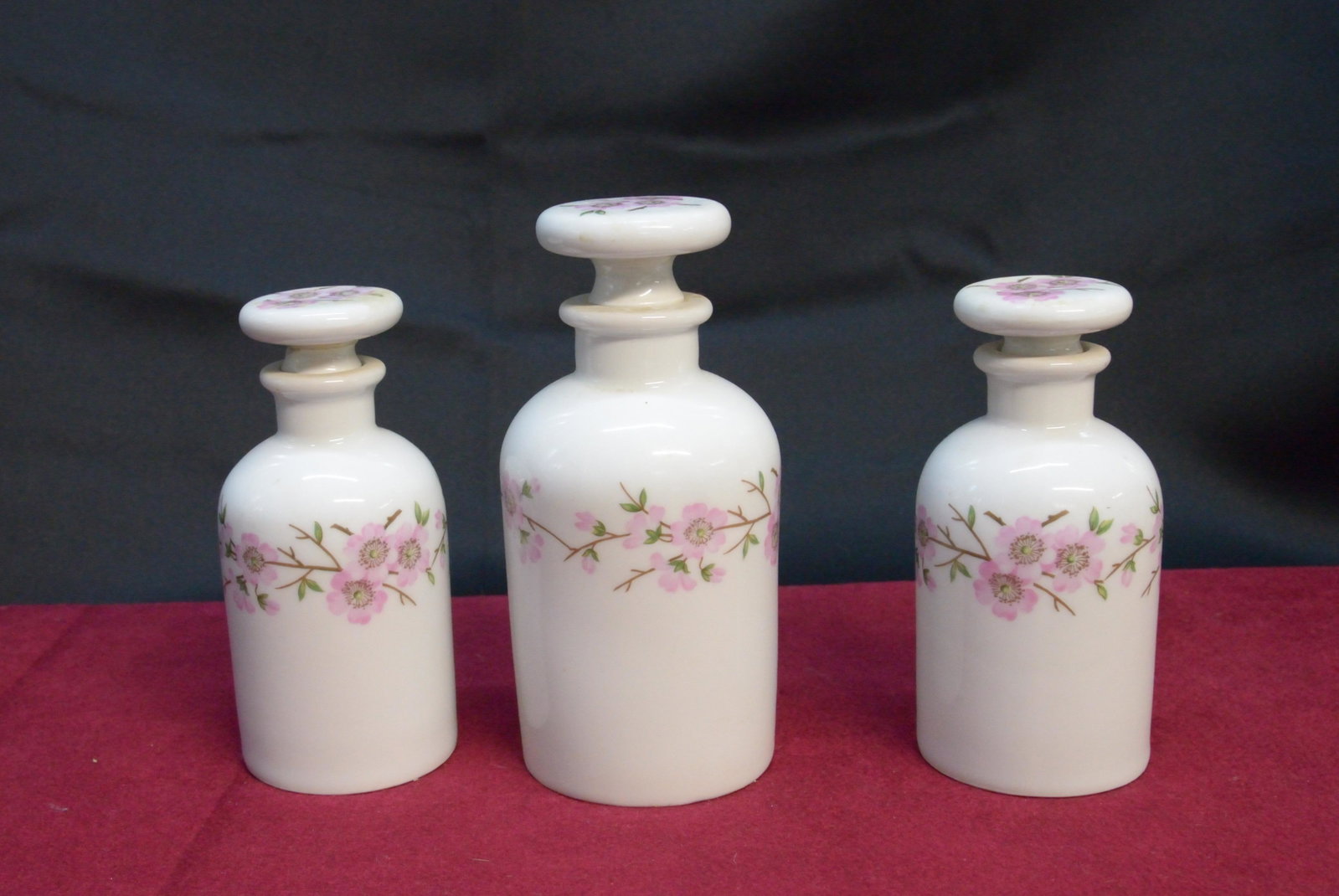 Pouyat floral motif porcelain jars with stoppers 1773: Pouyat floral motif porcelain jars with stoppers 1773 Paris, France tallest is 6"