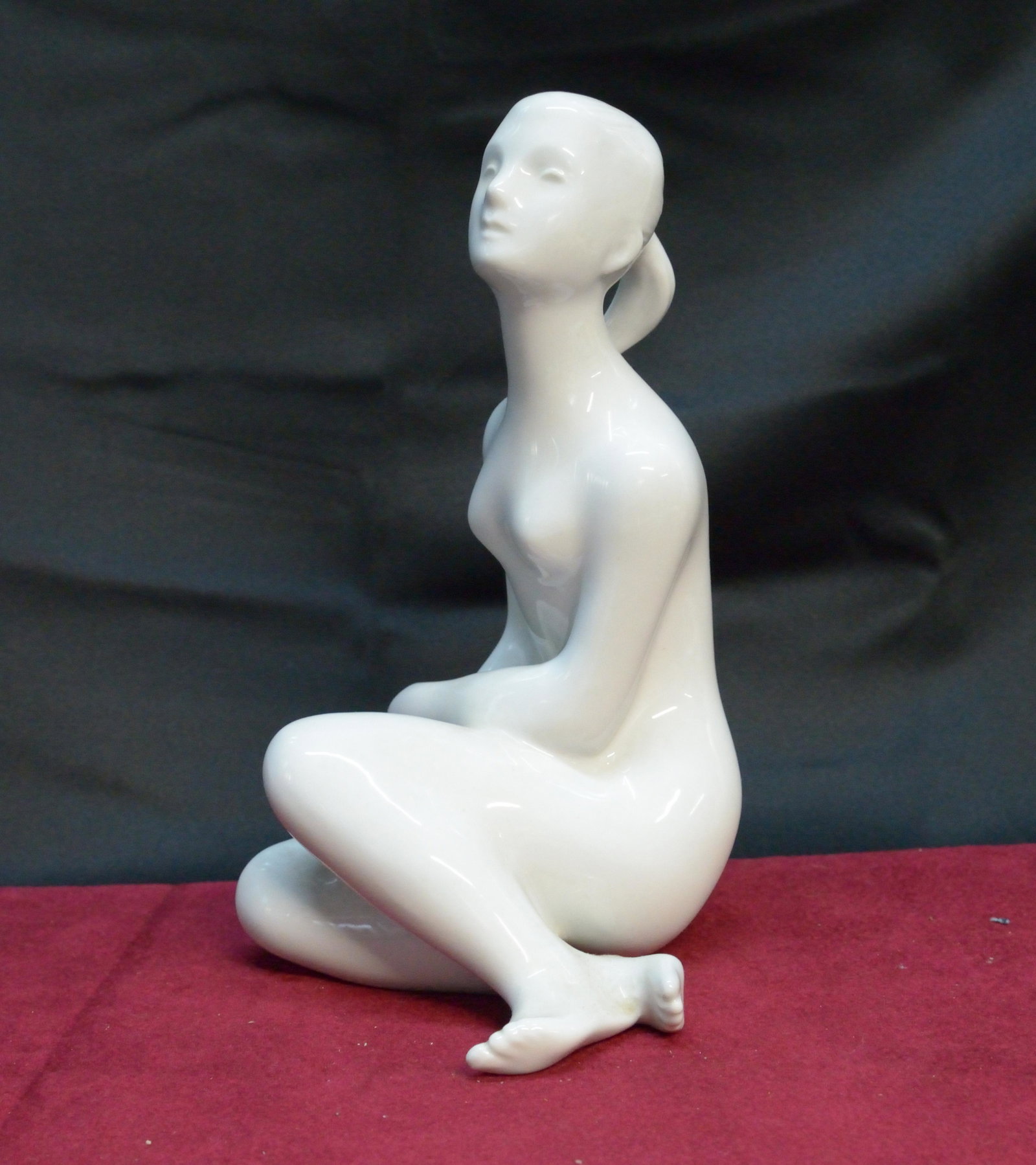 Royal Dux ceramic statue of woman sitting 9" tall: Royal Dux ceramic statue of woman sitting 9" tall