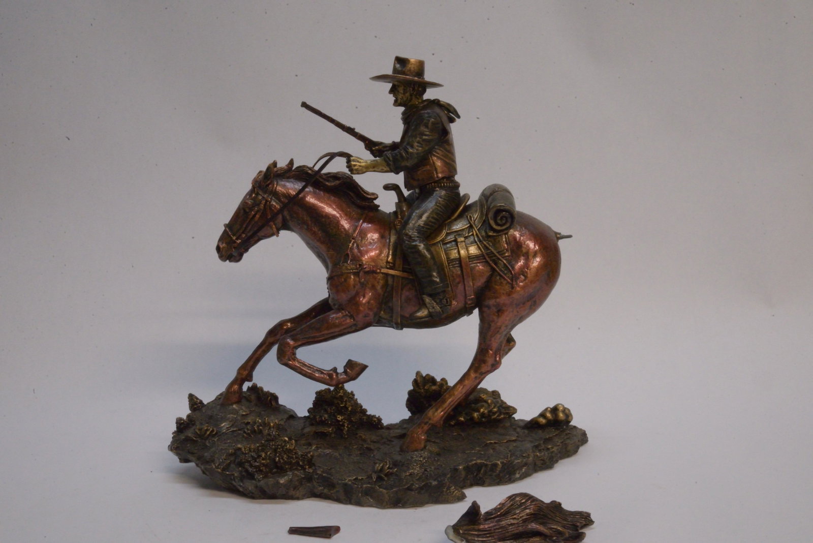 "Galloping Thunder" sculpture from John Wayne - Tall In: Tail and rifle stock broken 9.5" long 8.5" tall