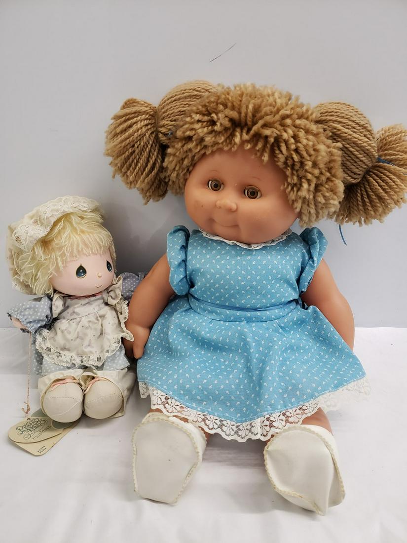 Cabbage Patch doll and Precious Moments doll (1 of 1)
