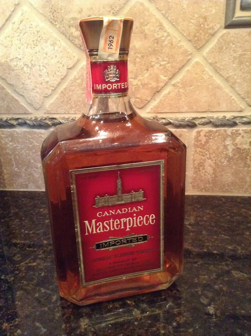 1962 Unbroken Tax Stamp Canadian Masterpiece Whiskey: Any contents in bottle is Free; You are bidding on the bottle & unbroken tax stamp
