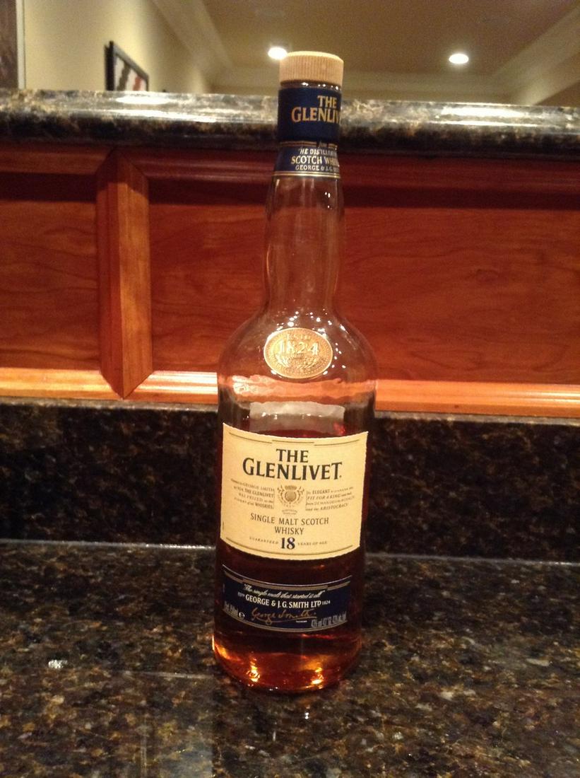 Glenlivet 18 Year Single Malt Scotch 750ml: Any contents in bottle is Free; You are bidding on the bottle & unbroken tax stamp