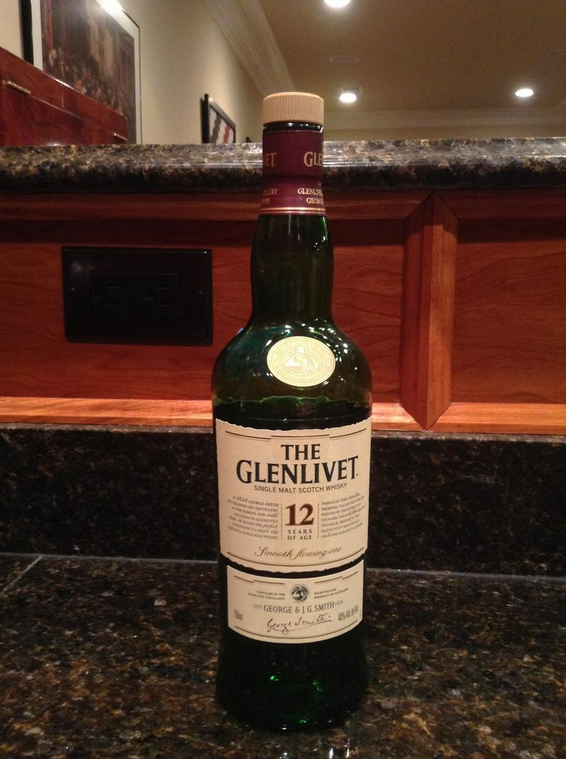 Glenlivet 12 Year Single Malt Scotch 750ml: Any contents in bottle is Free; You are bidding on the bottle & unbroken tax stamp