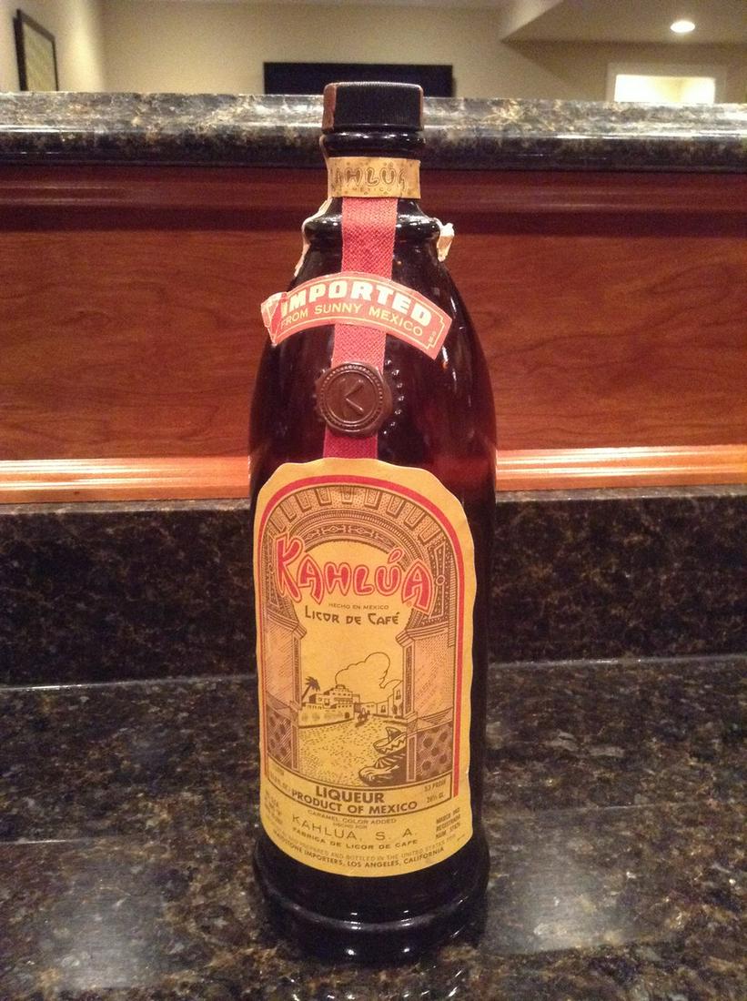 Kahlua 1L: Any contents in bottle is Free; You are bidding on the bottle & unbroken tax stamp