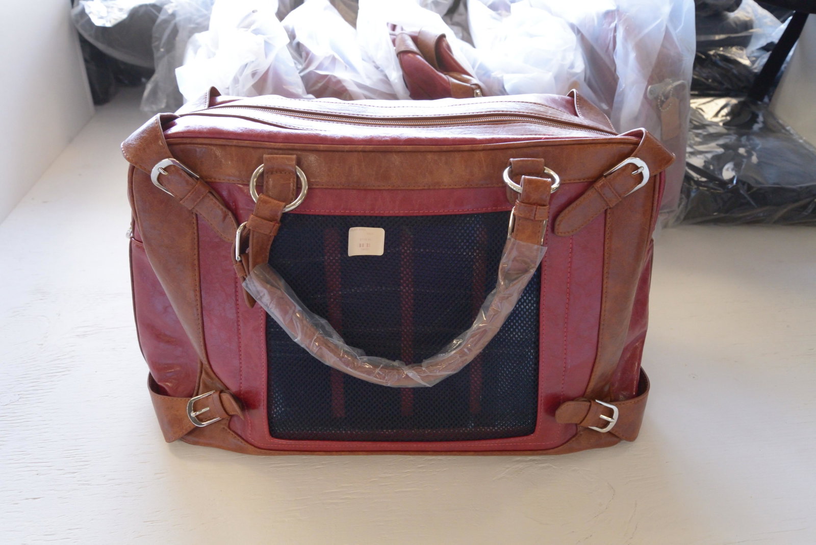 5 Red Solar Duffel Bags: MSRP $159.95/ea Dimensions 19x9x10.5