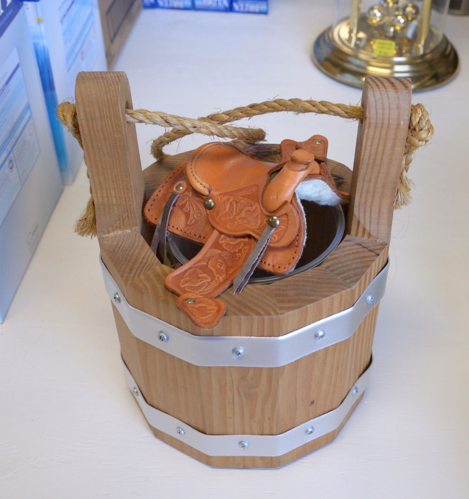 Bucket and miniature leather saddle (1 of 1)