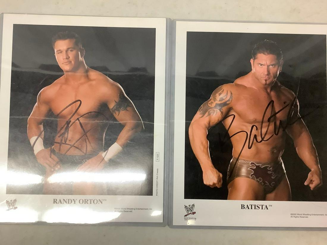 Signed Batista and Randy Orton photos: Signed Batista and Randy Orton photos