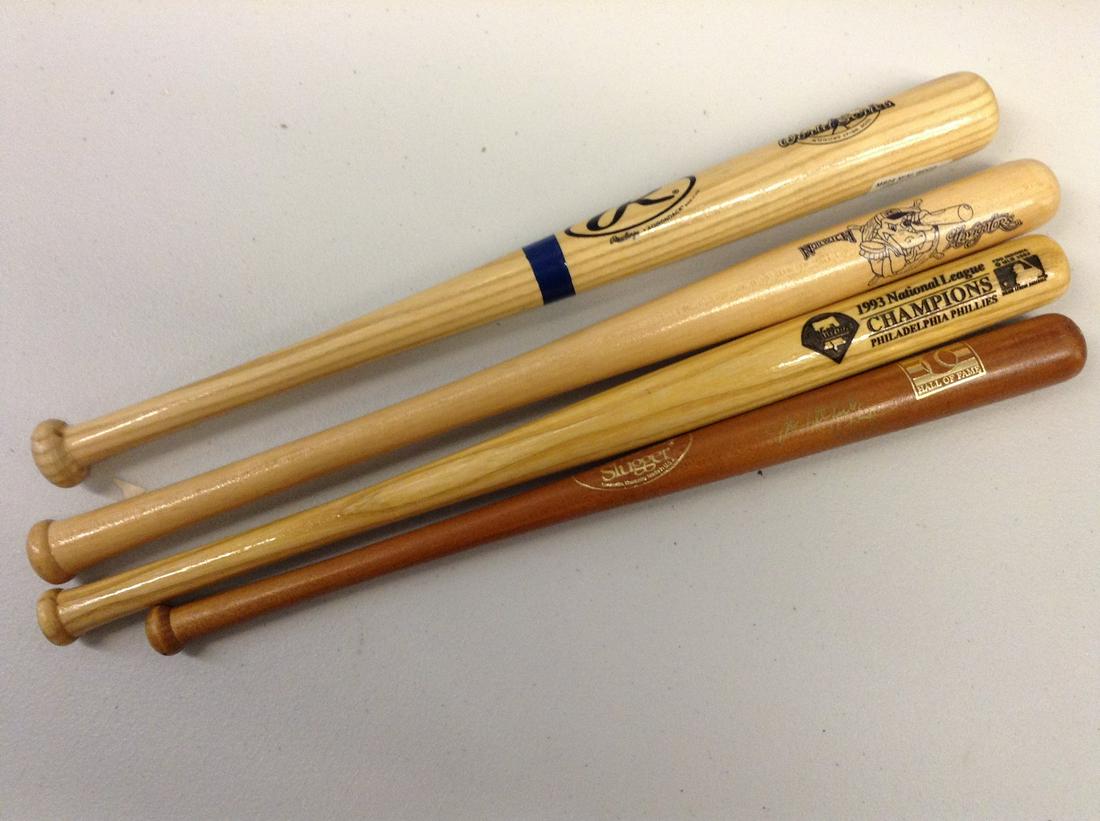 Lot of four miniature baseball bats one signed (1 of 1)