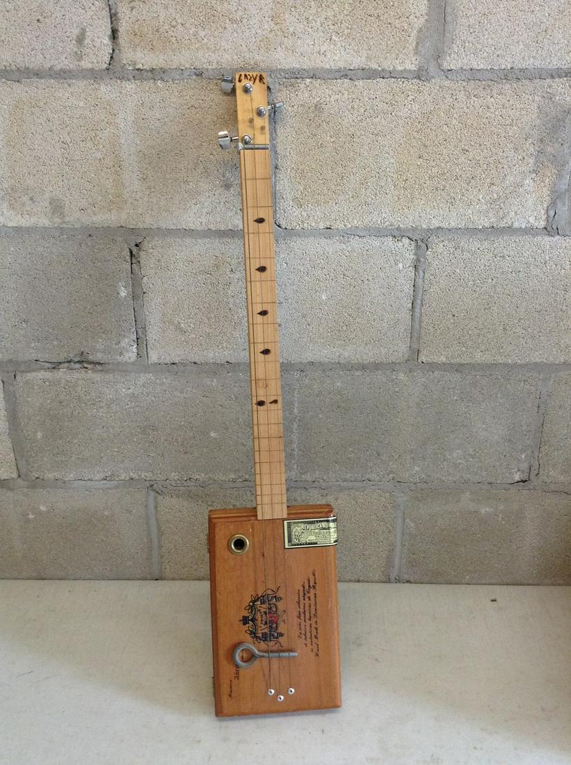 Domican cigar box instrument (1 of 1)