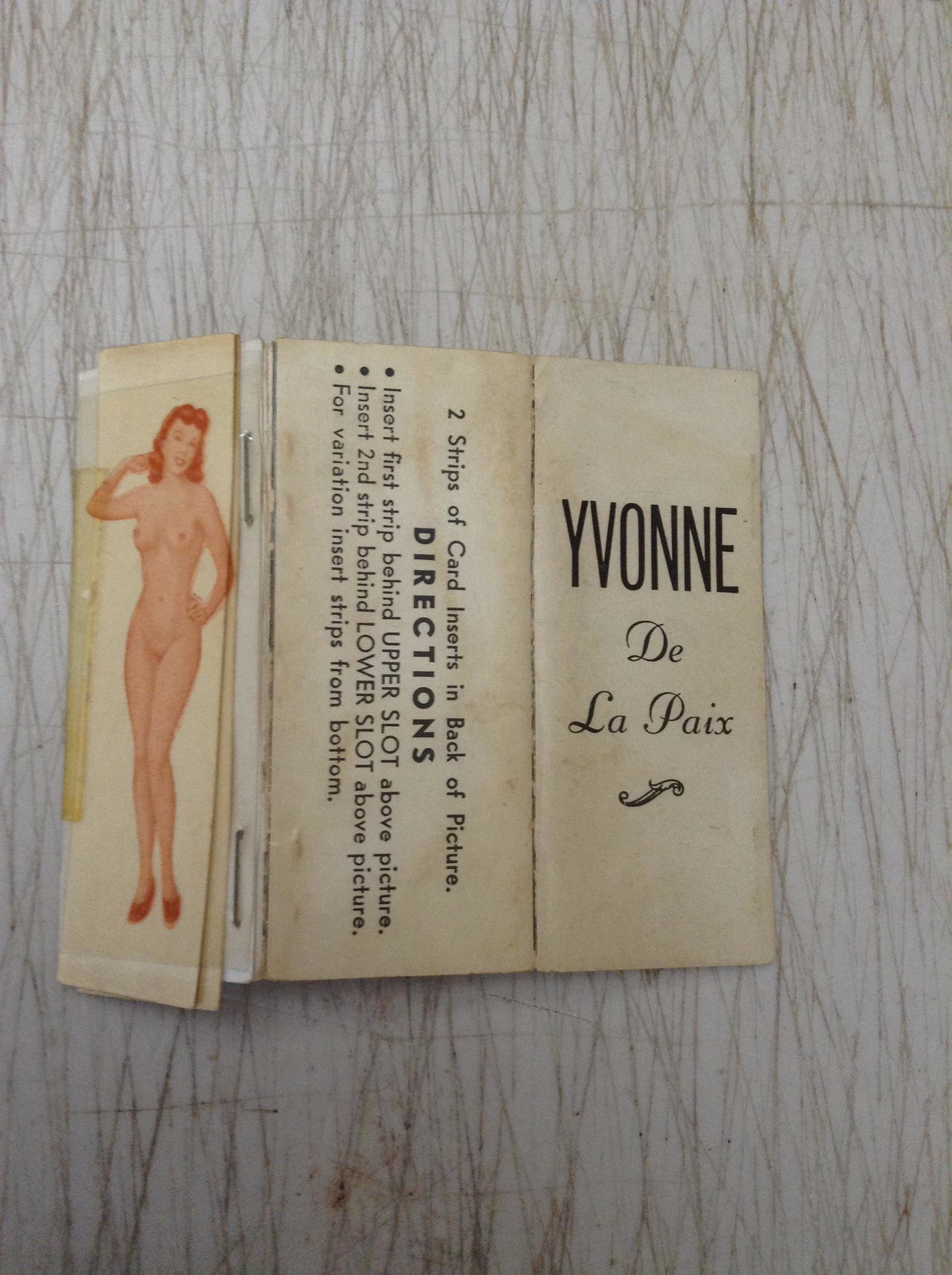 Yvonne De La Paix Risque Cardboard Card Changes from: Yvonne De La Paix Risque Cardboard Card Changes from Nude to clothes