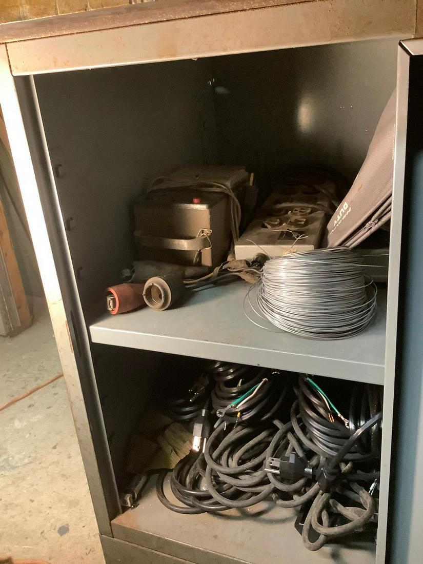 cabinet full of new line cords: cabinet full of new line cords