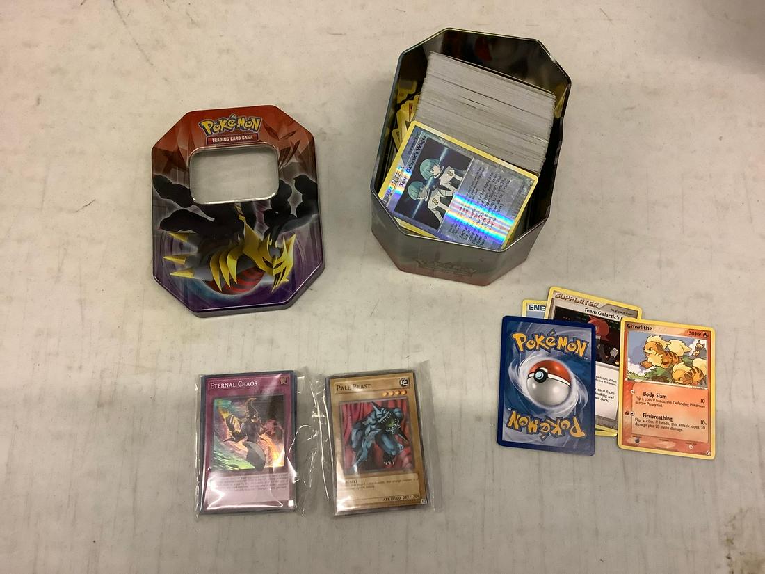 Pokemon tin full of pokemon and yu gi oh cards (1 of 1)