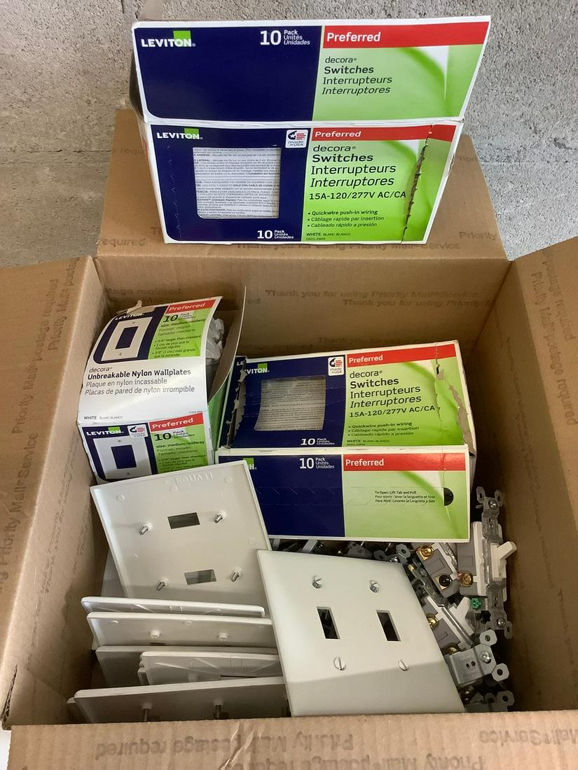 Large lot of assorted light switches and wall plates (1 of 1)