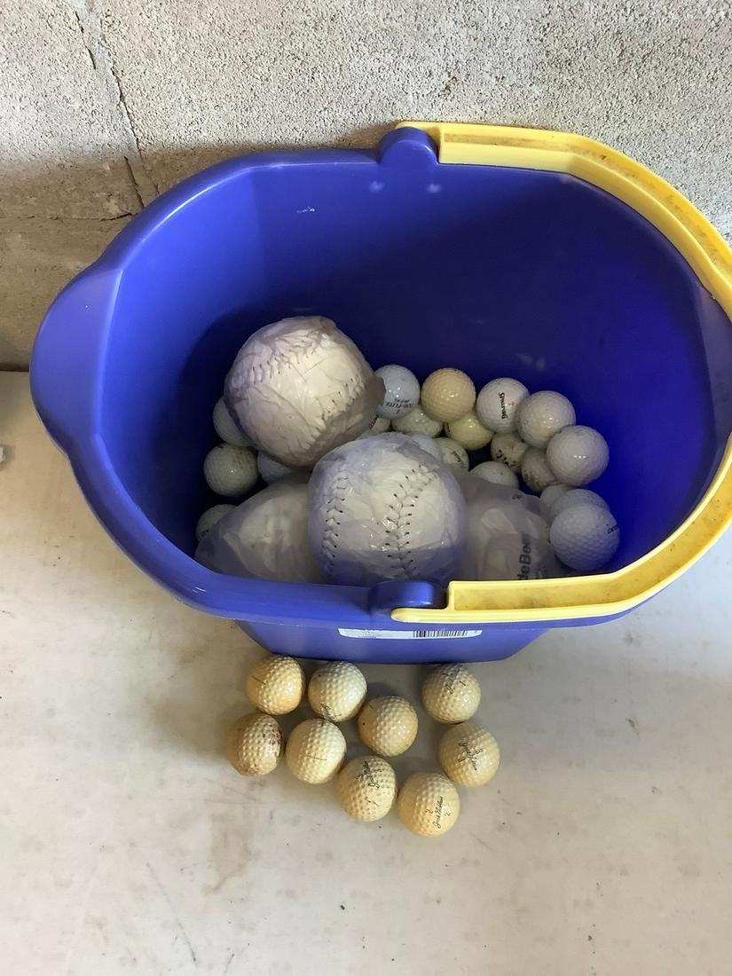 Bucket of golf balls signed and unsigned, softballs and (1 of 1)