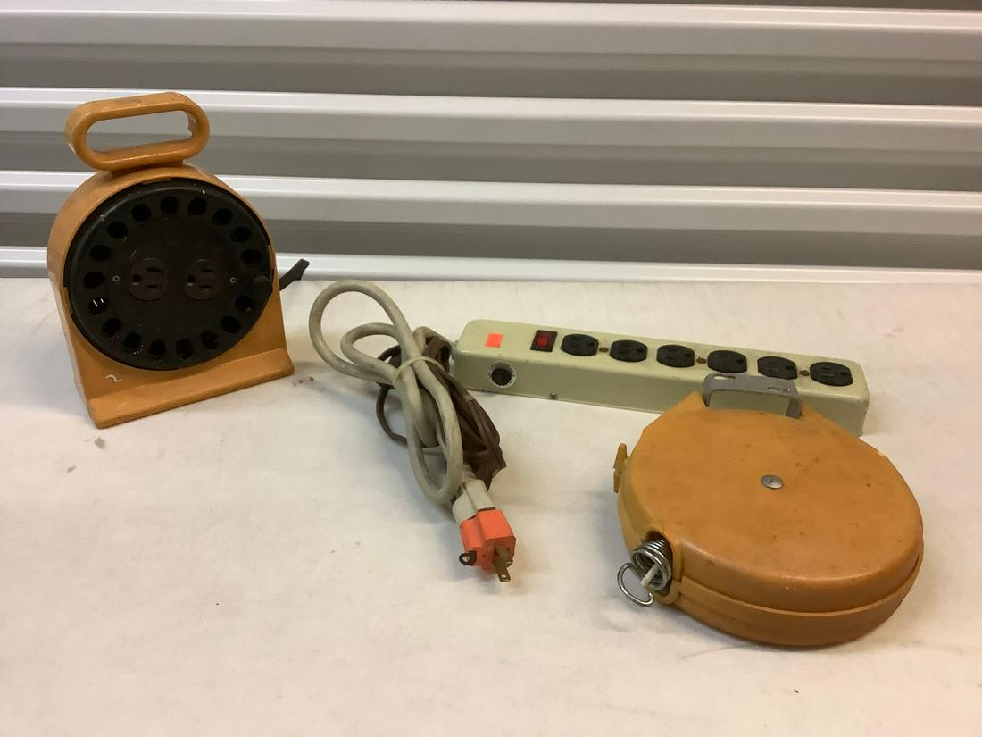 Surge protector and retractable extension cords (1 of 1)