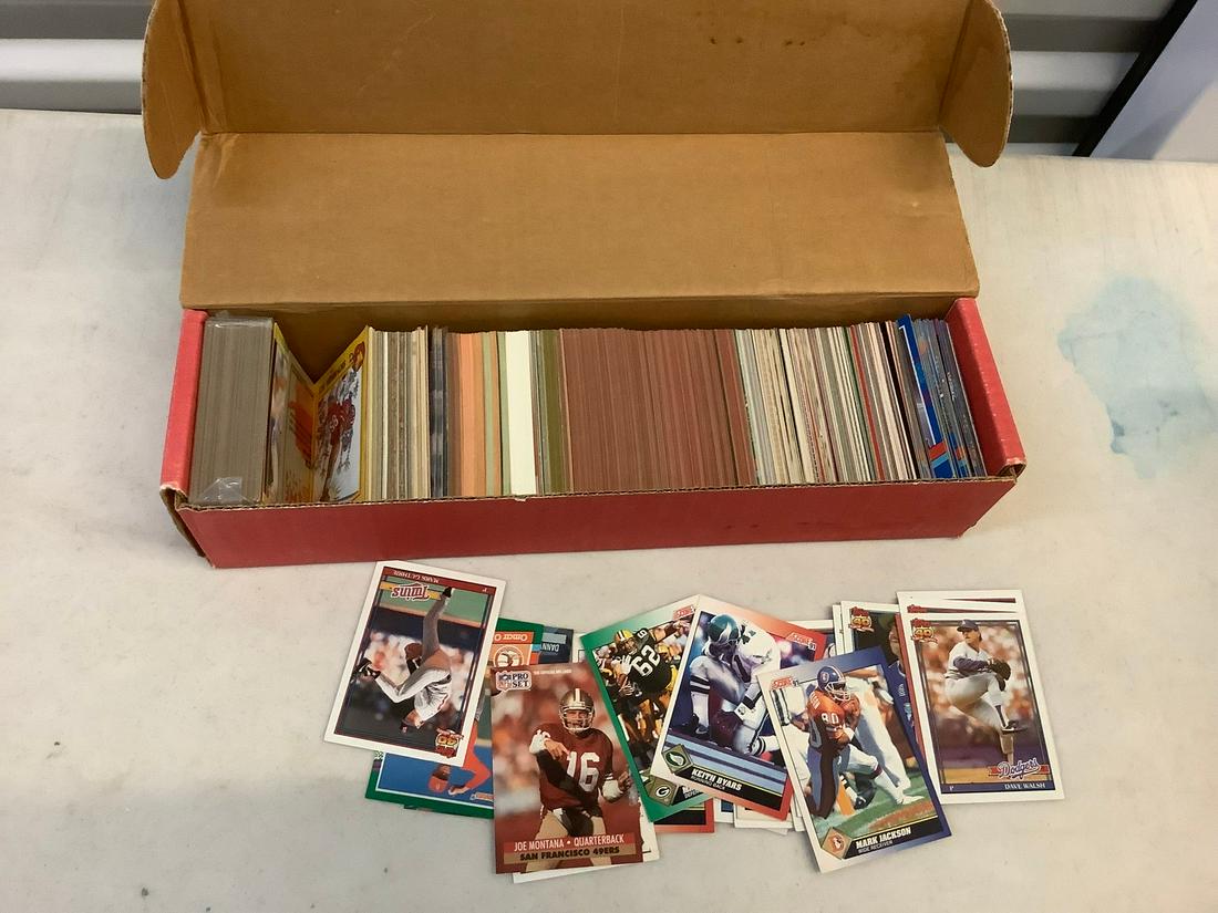 Box full of football and baseball cards various years (1 of 1)