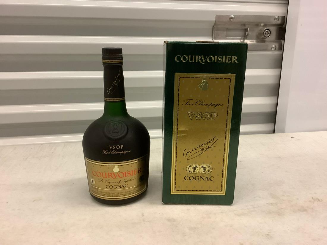 Courvoisier Champagne Cognac 750 mL bottle: Any contents in bottle is Free; You are bidding on the bottle & unbroken tax stamp