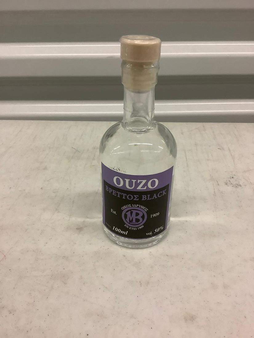 Ouzo 100mL bottle: Any contents in bottle is Free; You are bidding on the bottle & unbroken tax stamp