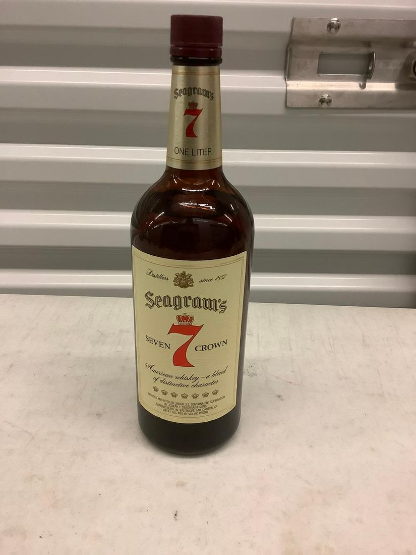 Seagram's Seven Crown American Whiskey 1L bottle: Any contents in bottle is Free; You are bidding on the bottle & unbroken tax stamp