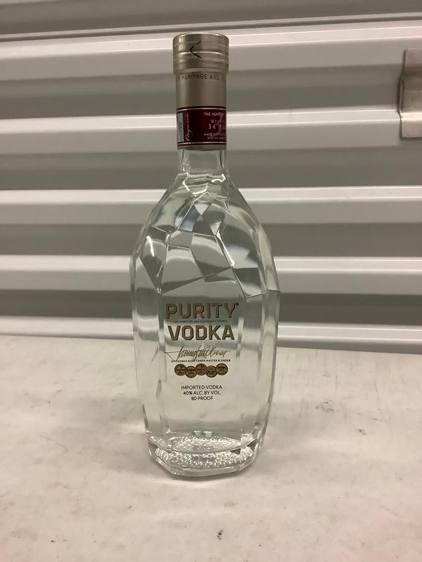 Purity Vodka 750 mL bottle: Any contents in bottle is Free; You are bidding on the bottle & unbroken tax stamp