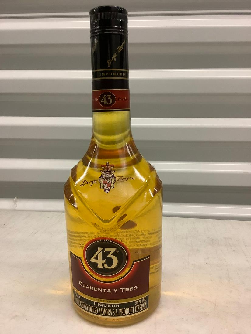Cuarenta Y Tres Liquer 750mL bottle: Any contents in bottle is Free; You are bidding on the bottle & unbroken tax stamp