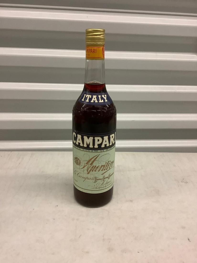 Italy Campari Liqueur 750mL bottle: Any contents in bottle is Free; You are bidding on the bottle & unbroken tax stamp