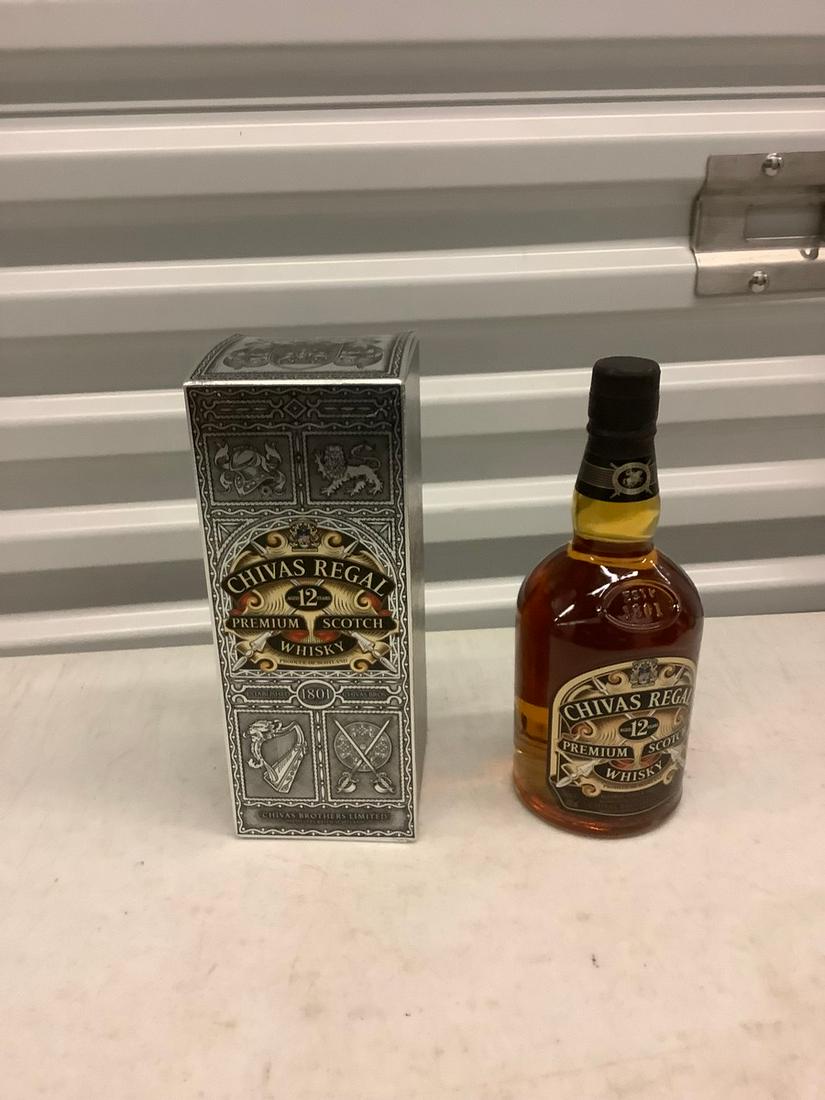 Chivas Premium Scotch Whiskey 750 mL bottle: Any contents in bottle is Free; You are bidding on the bottle & unbroken tax stamp