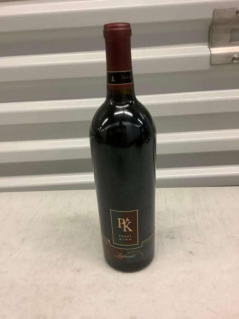 Pezzi King 1999 Vintage 750 mL bottle: Any contents in bottle is Free; You are bidding on the bottle & unbroken tax stamp