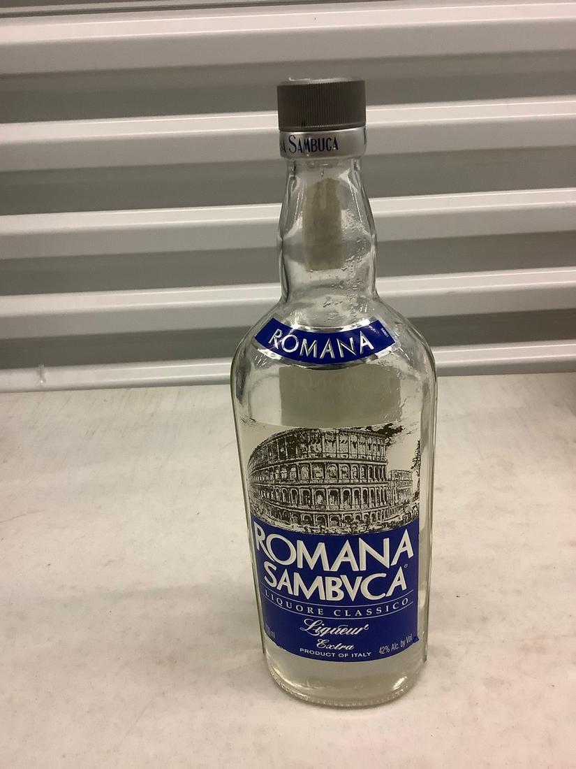 Romana Sambuca 750mL bottle: Any contents in bottle is Free; You are bidding on the bottle & unbroken tax stamp