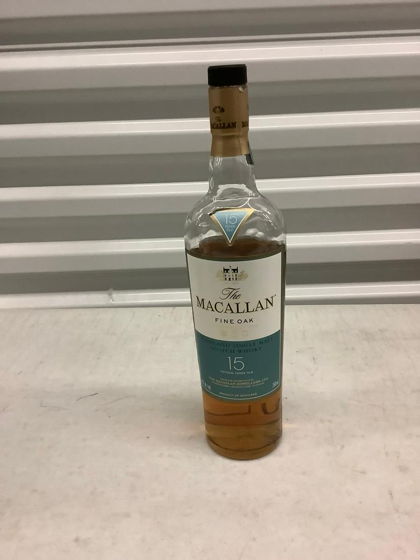 The Macallan Fine Oak Whiskey bottle 750mL: Any contents in bottle is Free; You are bidding on the bottle & unbroken tax stamp