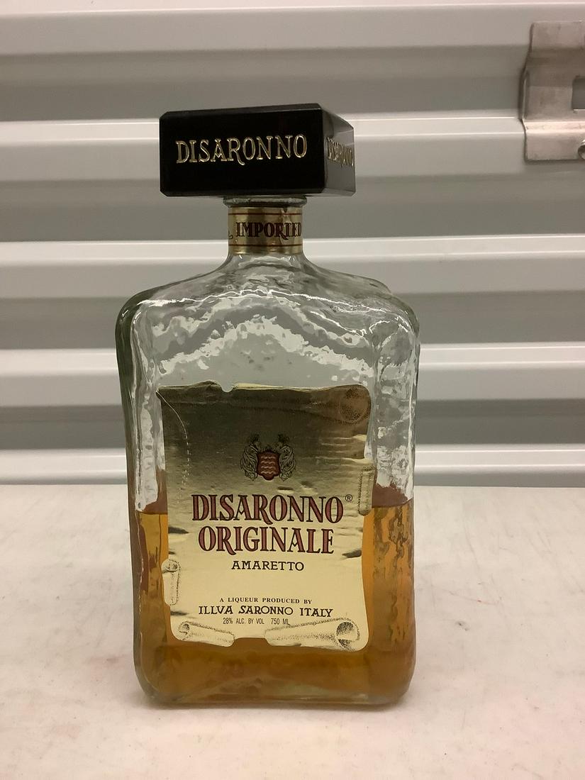 Disaronno Originale 750mL bottle: Any contents in bottle is Free; You are bidding on the bottle & unbroken tax stamp