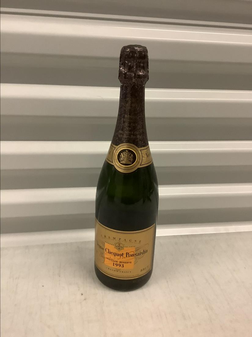 1993 Veuve Clicquot Ponsardin 750 ML Bottle: Any contents in bottle is Free; You are bidding on the bottle & unbroken tax stamp