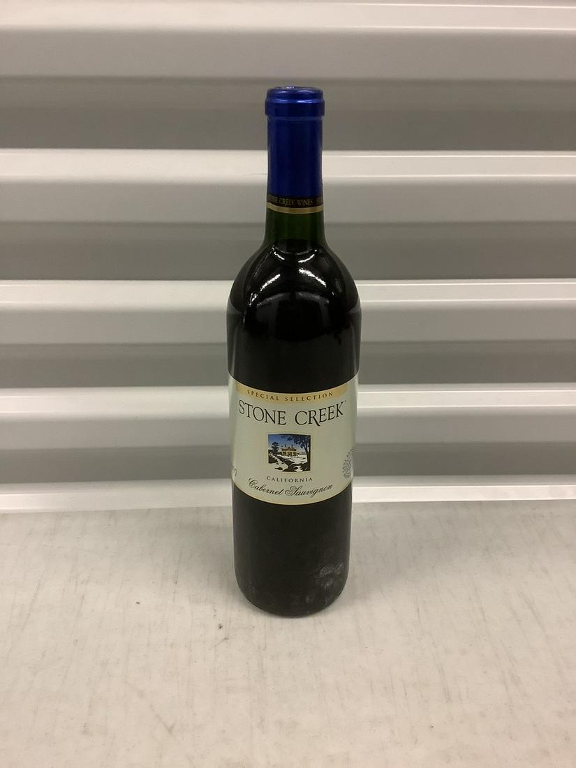 1997 Stone Creek California Cabernet Lauvignon 750 ML: Any contents in bottle is Free; You are bidding on the bottle & unbroken tax stamp