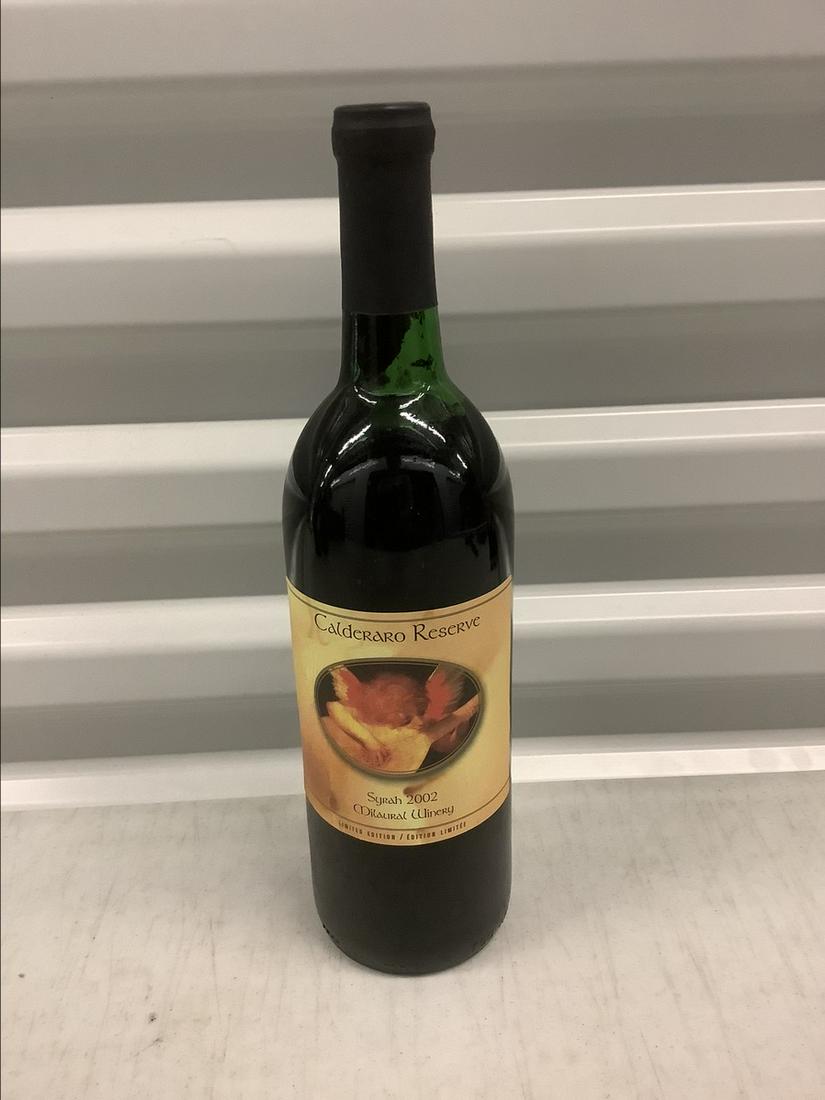 Limited Edition 2002 Calderaro Reserve 750 ML Bottle: Any contents in bottle is Free; You are bidding on the bottle & unbroken tax stamp