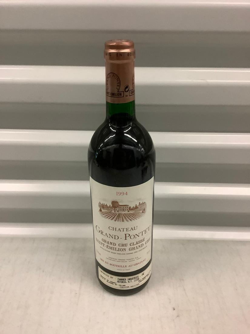 1994 Chateau Grand-Pontet 750 ML: Any contents in bottle is Free; You are bidding on the bottle & unbroken tax stamp