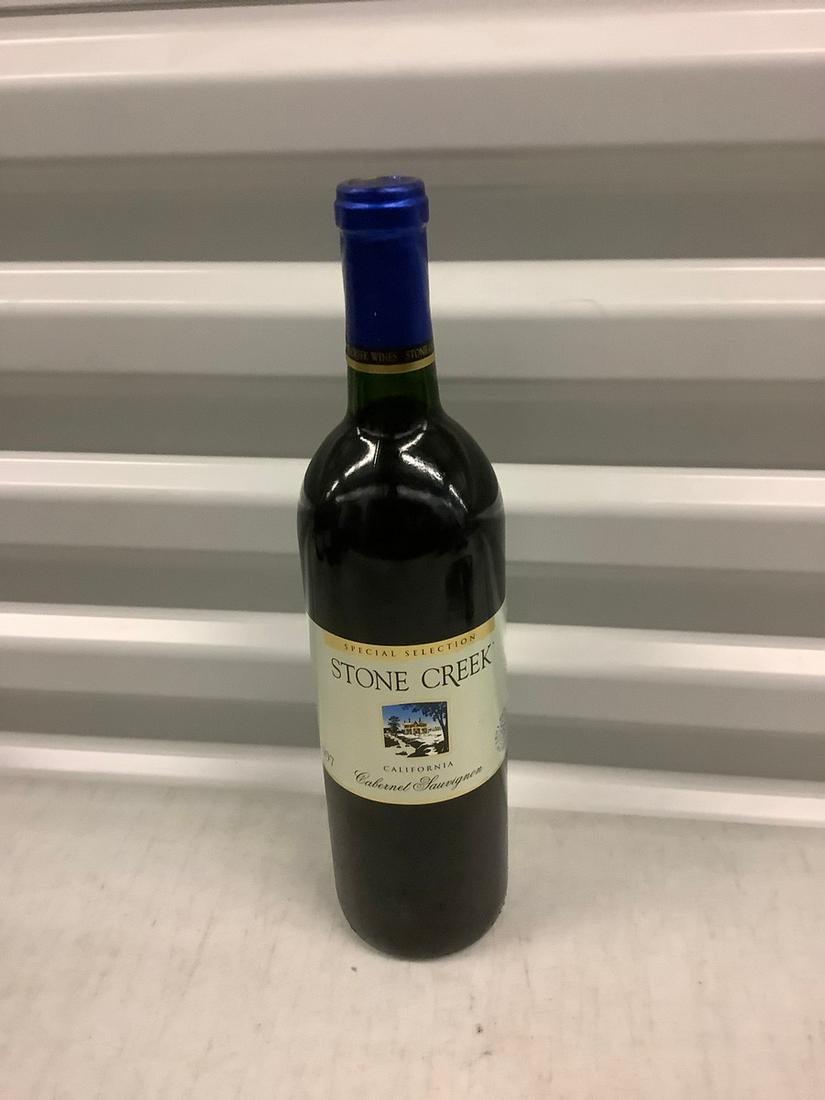 Special Selection 1997 Stone Creek Cabernet Sauvignon: Any contents in bottle is Free; You are bidding on the bottle & unbroken tax stamp