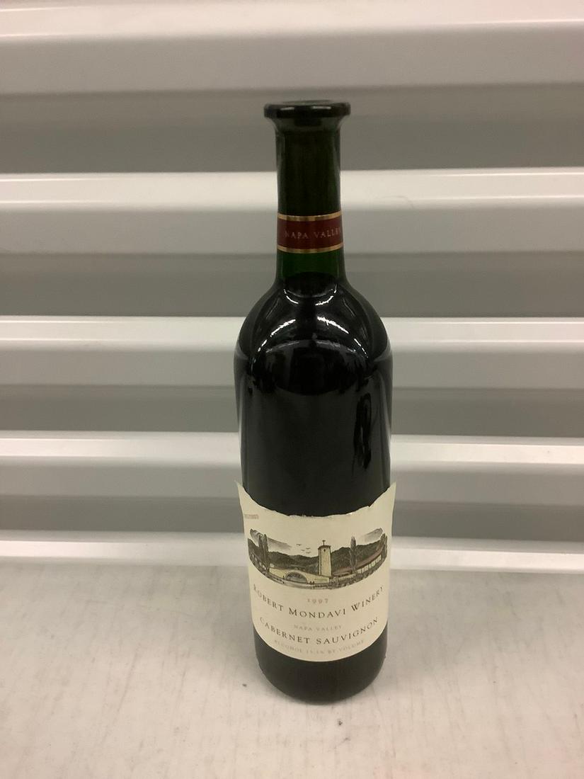 1997 Robert Mondavi Winery Cabernet Sauvignon 750 ML: Any contents in bottle is Free; You are bidding on the bottle & unbroken tax stamp
