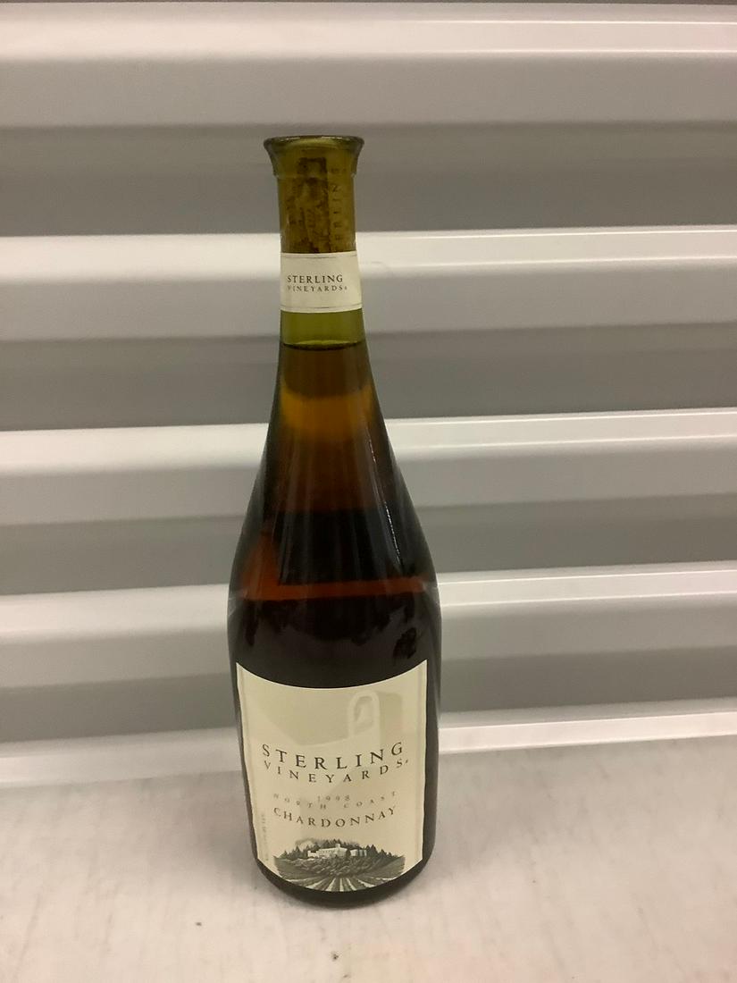 1998 Sterling Vineyards Chardonnay 750 ML: Any contents in bottle is Free; You are bidding on the bottle & unbroken tax stamp