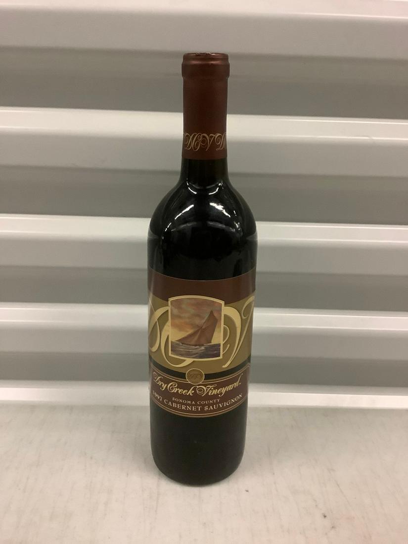 1997 Dry Creek Vineyard Cabernet Sauvignon 750 ML: Any contents in bottle is Free; You are bidding on the bottle & unbroken tax stamp