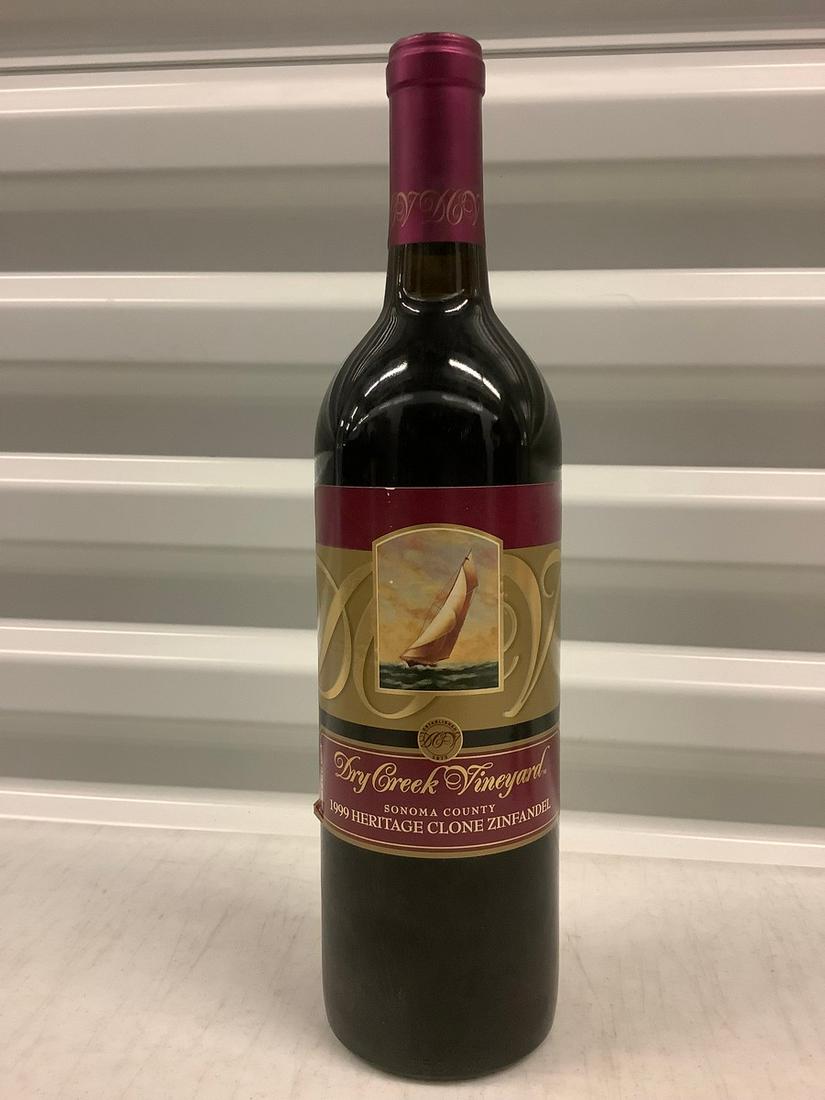 1999 Dry Creek Vineyard Heritage Clone Zifandel 750 ML: Any contents in bottle is Free; You are bidding on the bottle & unbroken tax stamp