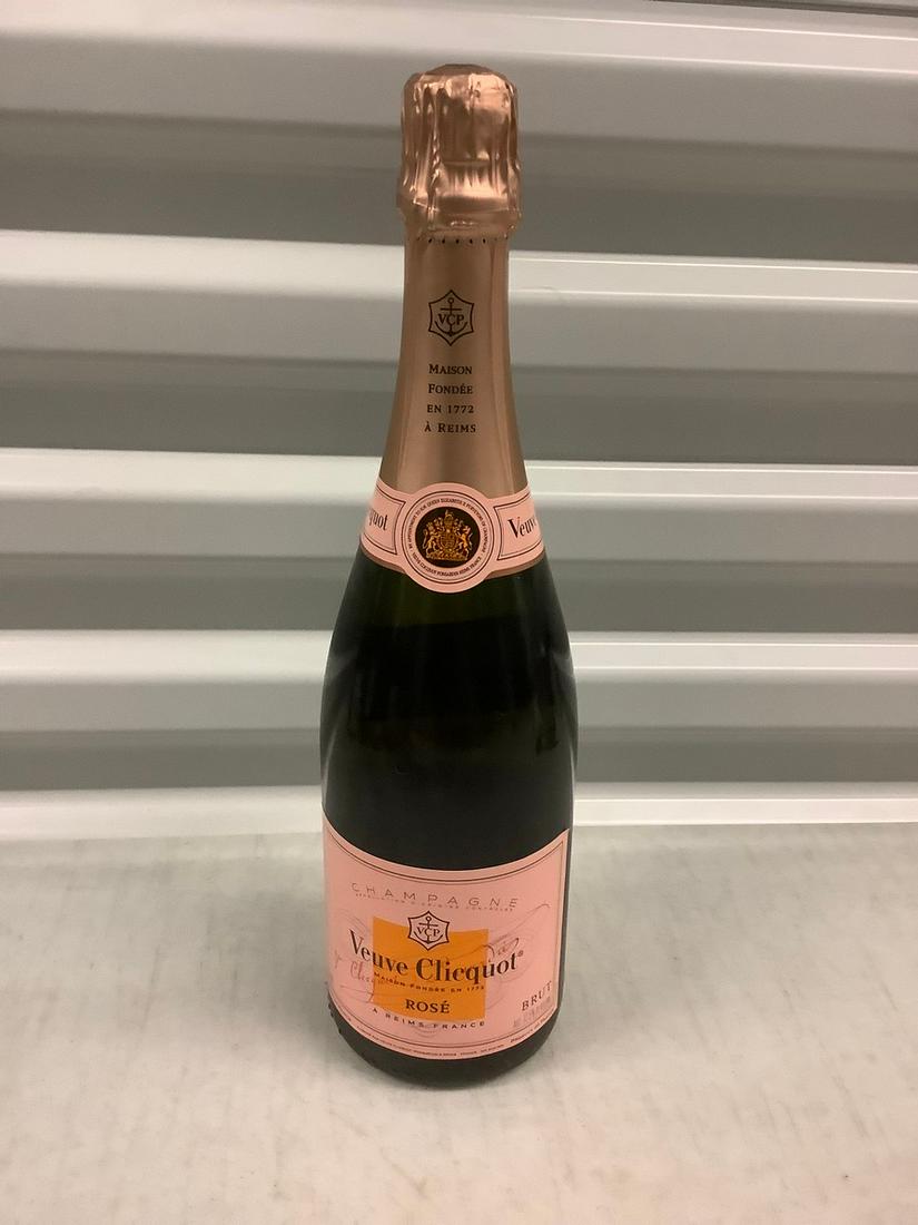 Veuve Clicquot Rose 750 ML: Any contents in bottle is Free; You are bidding on the bottle & unbroken tax stamp