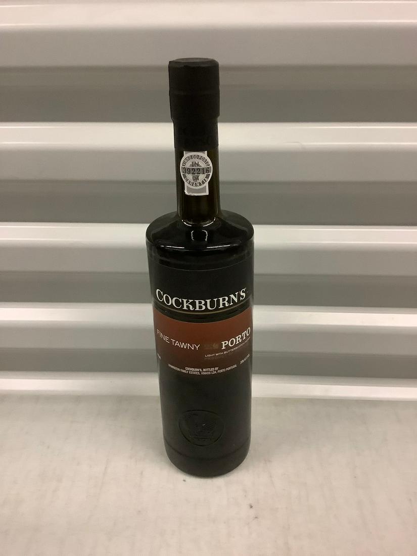 Cockburns Porto 750 ML: Any contents in bottle is Free; You are bidding on the bottle & unbroken tax stamp