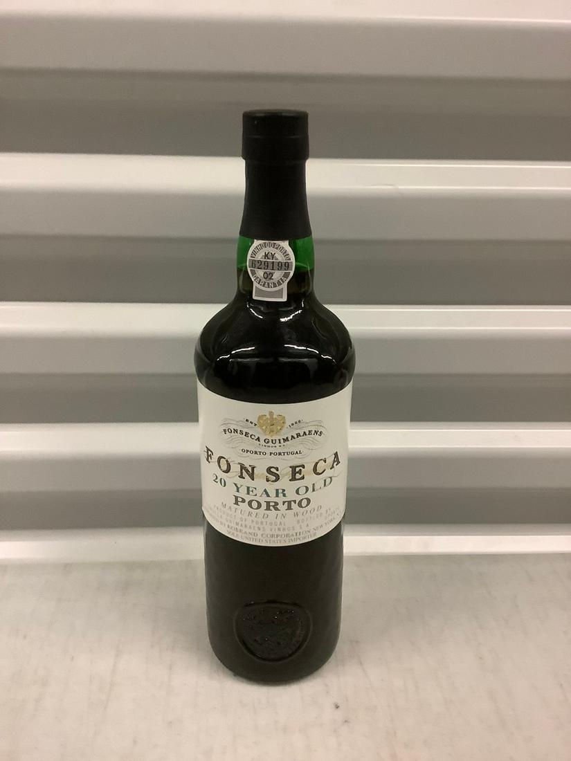 1999 Fonseca Porto 750 ML: Any contents in bottle is Free; You are bidding on the bottle & unbroken tax stamp