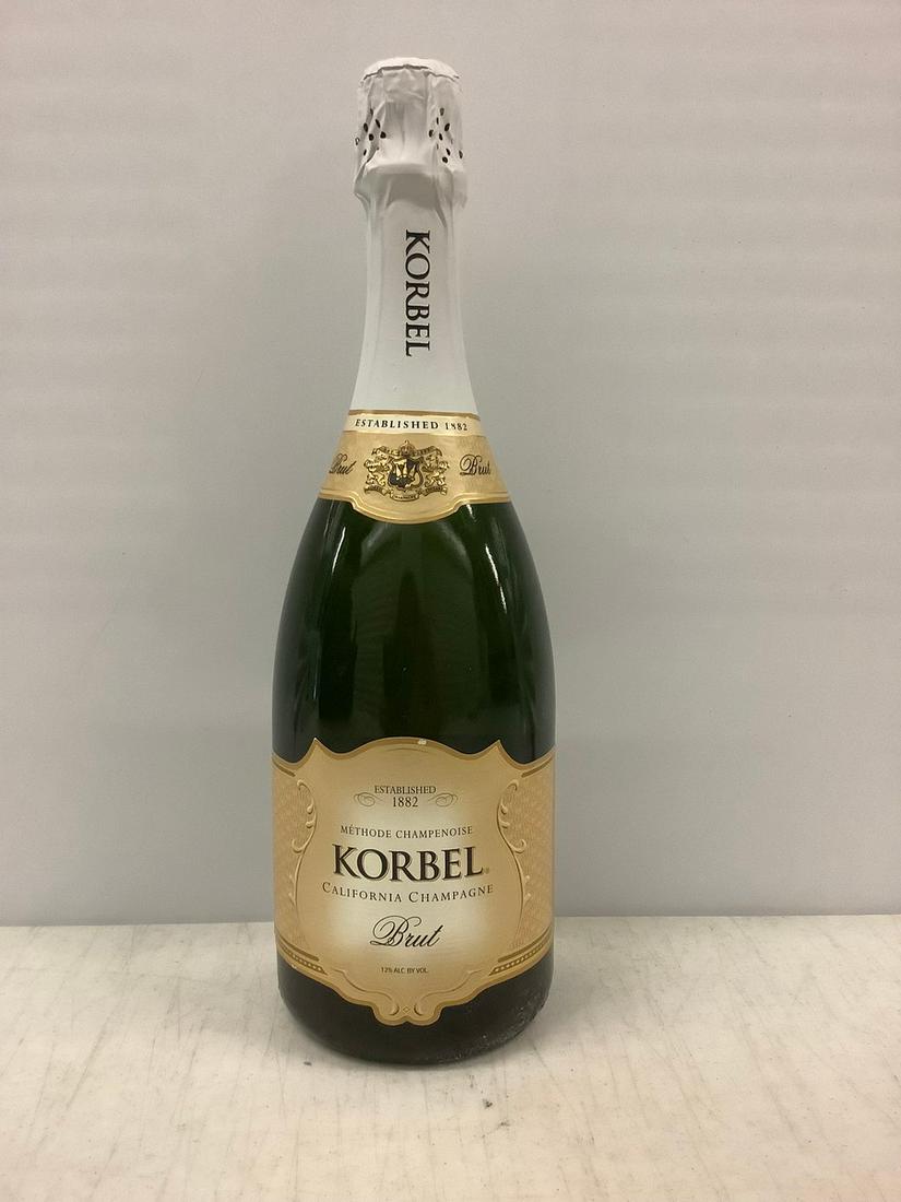 Korbel California Champagne 750 ML: Any contents in bottle is Free; You are bidding on the bottle & unbroken tax stamp