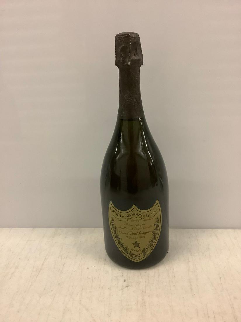 1992 Moet et Chandon a Epernay Champagne 750 ML: Any contents in bottle is Free; You are bidding on the bottle & unbroken tax stamp