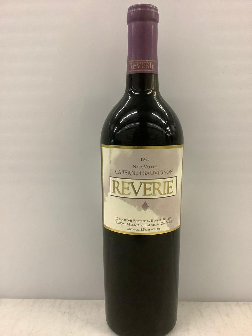 1995 Reverie 750 ML: Any contents in bottle is Free; You are bidding on the bottle & unbroken tax stamp